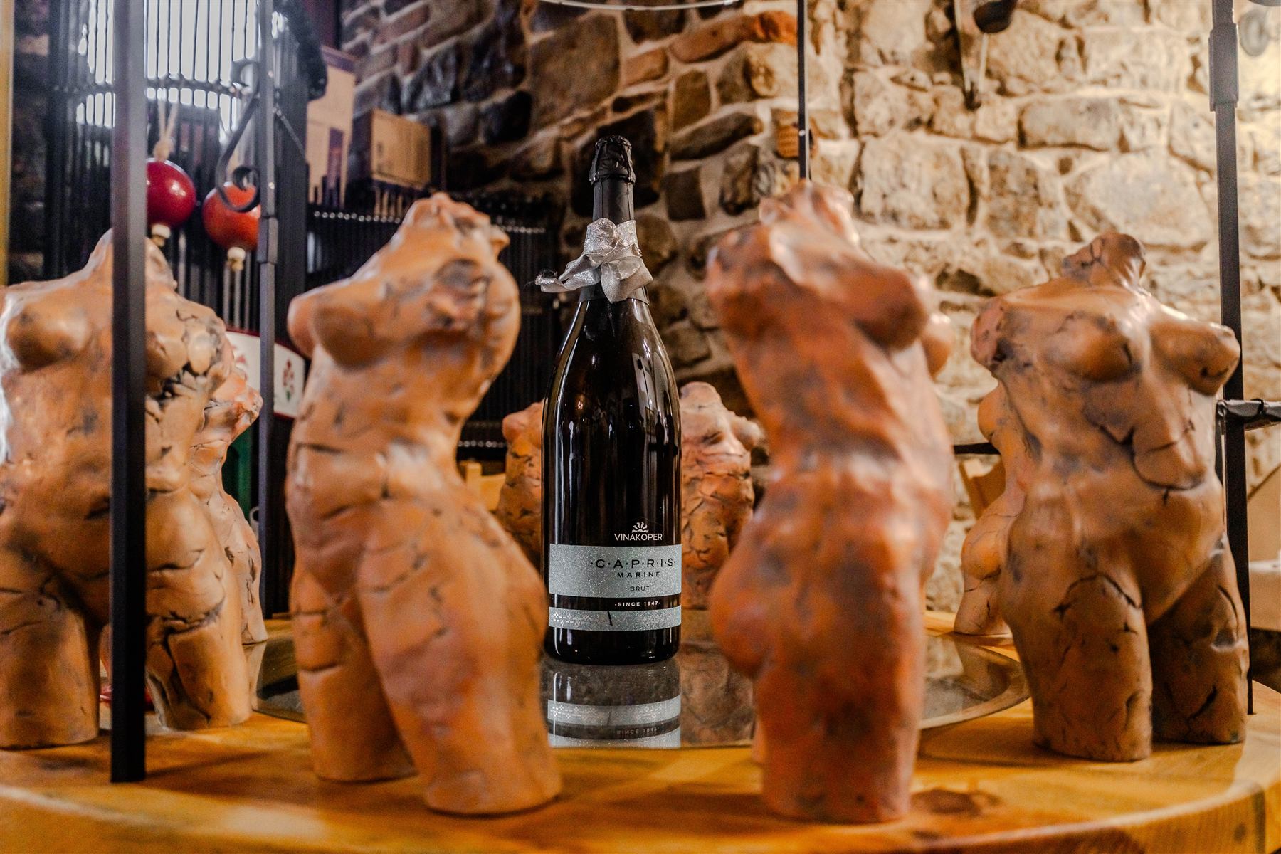 Stone wall and clay sculptures